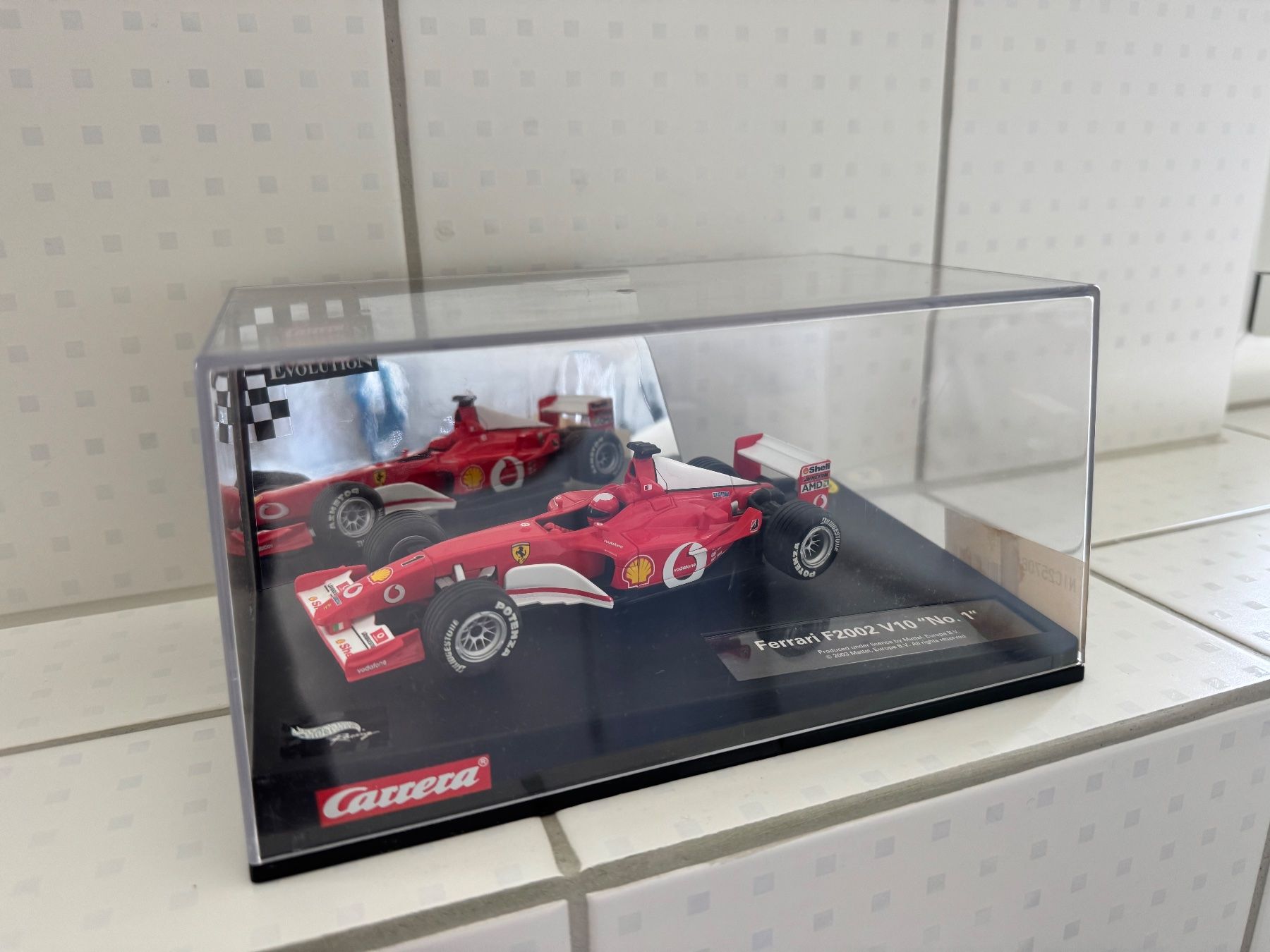 Carrera Modellini d'auto: Carrera 25706 Evolution Ferrari F2002 V10 "No. 1" – Usato da Winterthur venduto da dan_692p