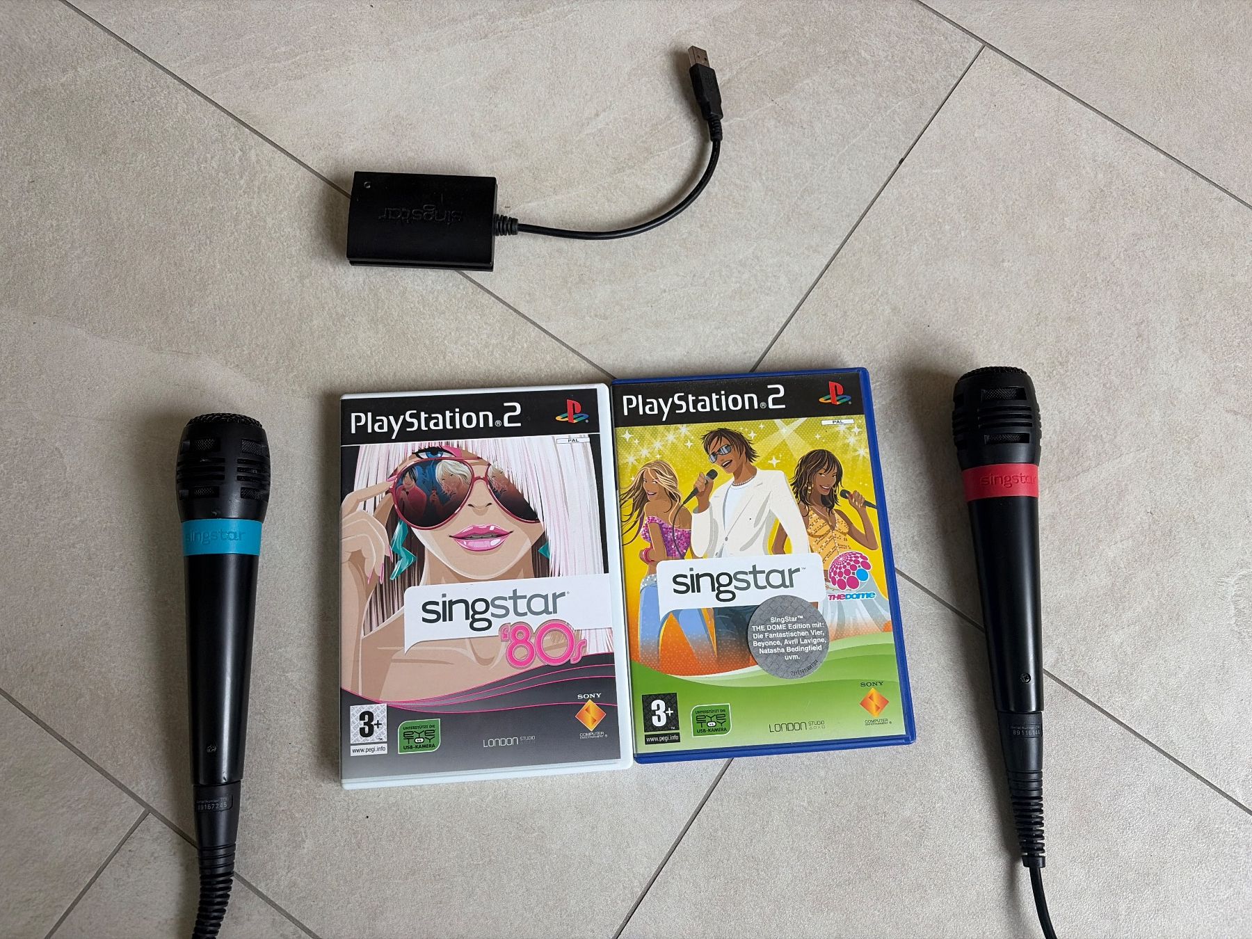 Microphones: SingStar PS2 Set mit 2 Original-Mikrofonen + USB-Adapter – D'occasion à Rüti ZH par Butterfly206cc 2