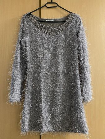 Grauer Puli mit Schmuckdetails - perfekt für den Winter!