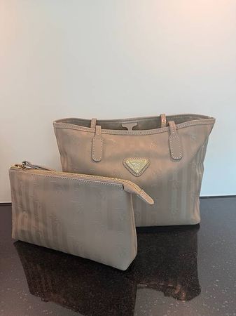 Maison Mollerus Genf Taupe mit Gold