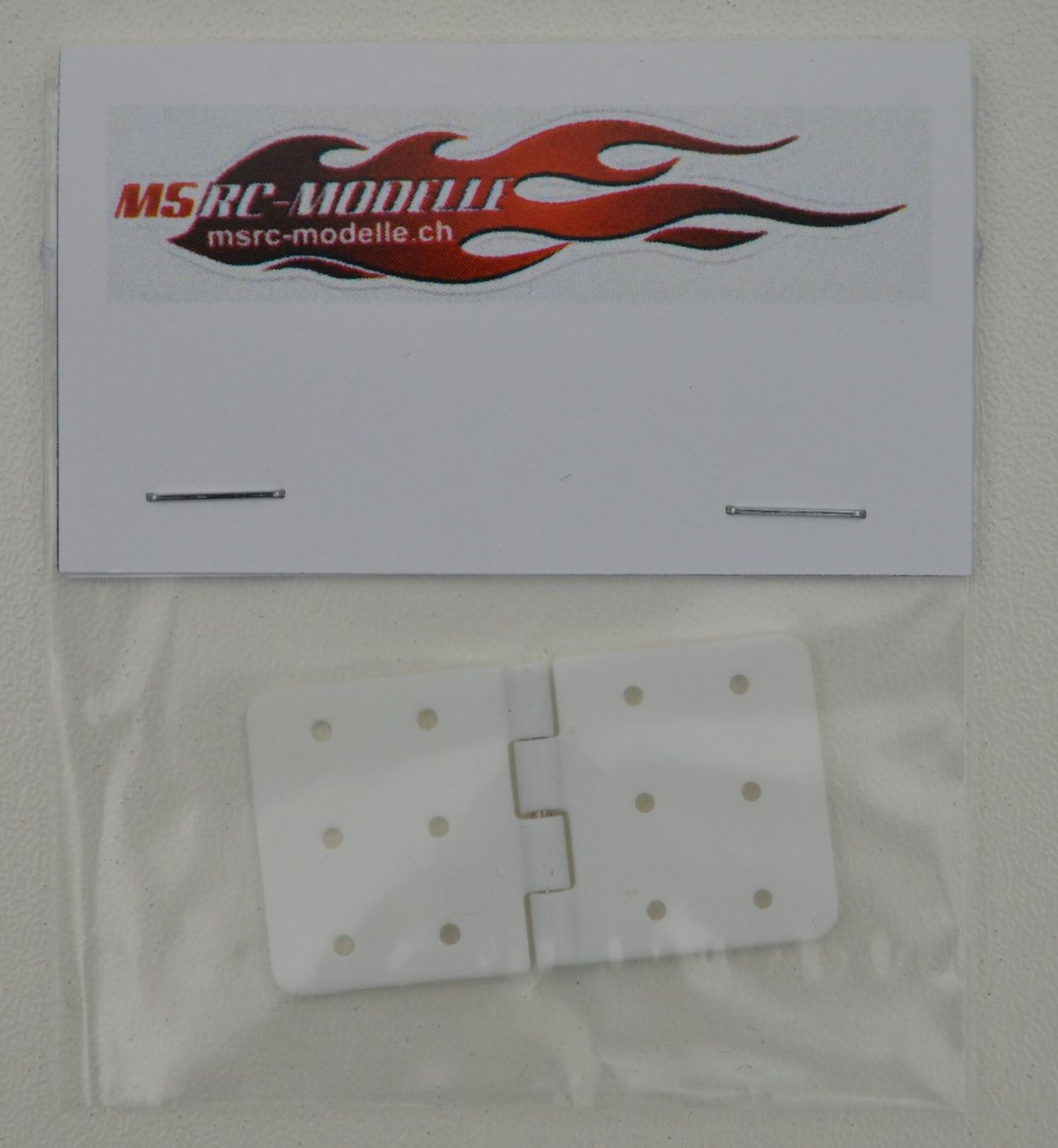 Modellismo RC: Scharnier Flach 20x36mm 1Stk. – Nuovo e nell'imballaggio originale da Rüti ZH venduto da MSRC-Modelle
