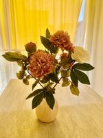 Pink vase and fake flowers