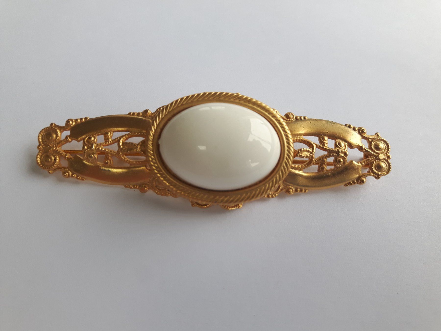 Spille & Fermagli: Goldene Brosche mit weissem Stein, elegant – Usato da Beckenried venduto da SylvkensWorld 3