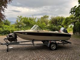 Boot Hellwig Triton mit Anhänger und Honda Motor (50PS)