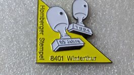 Ansteckpin 213: Hans Homberger AG