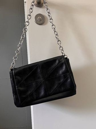 Borsa nera con dettagli argento