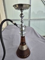 Wasserpfeife Shisha braun mit Schlangenschlauch.