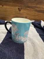 Hellblaue Blumentasse