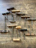Zapfenzieher mit Holzgriffen. 13 Ex
