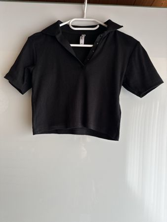 Schwarzes Poloshirt von page one  - Grösse XS bauchfrei