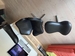 Ledersessel mit Hocker