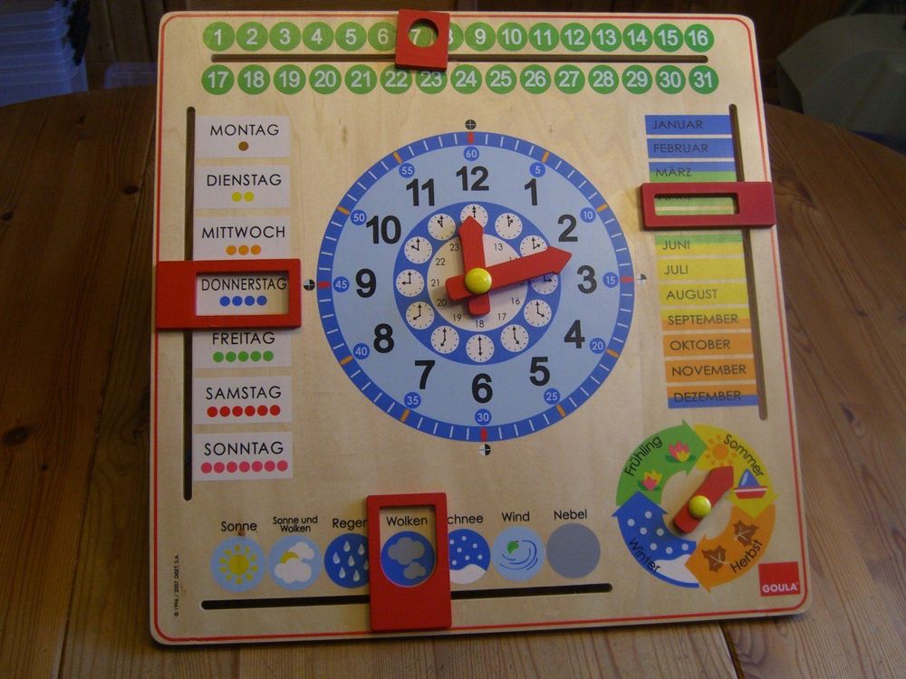 Toller "Goula" Kalender, Uhr aus Holz  Kaufen auf Ricardo