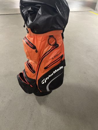 Golfbag TaylorMade Deluxe Waterproof orange schwarz