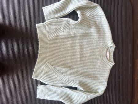 Helle Cordhose und kuscheliger Strickpullover