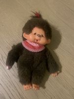 Monchhichi Plüschfigur braun mit rotem Lätzchen gebraucht