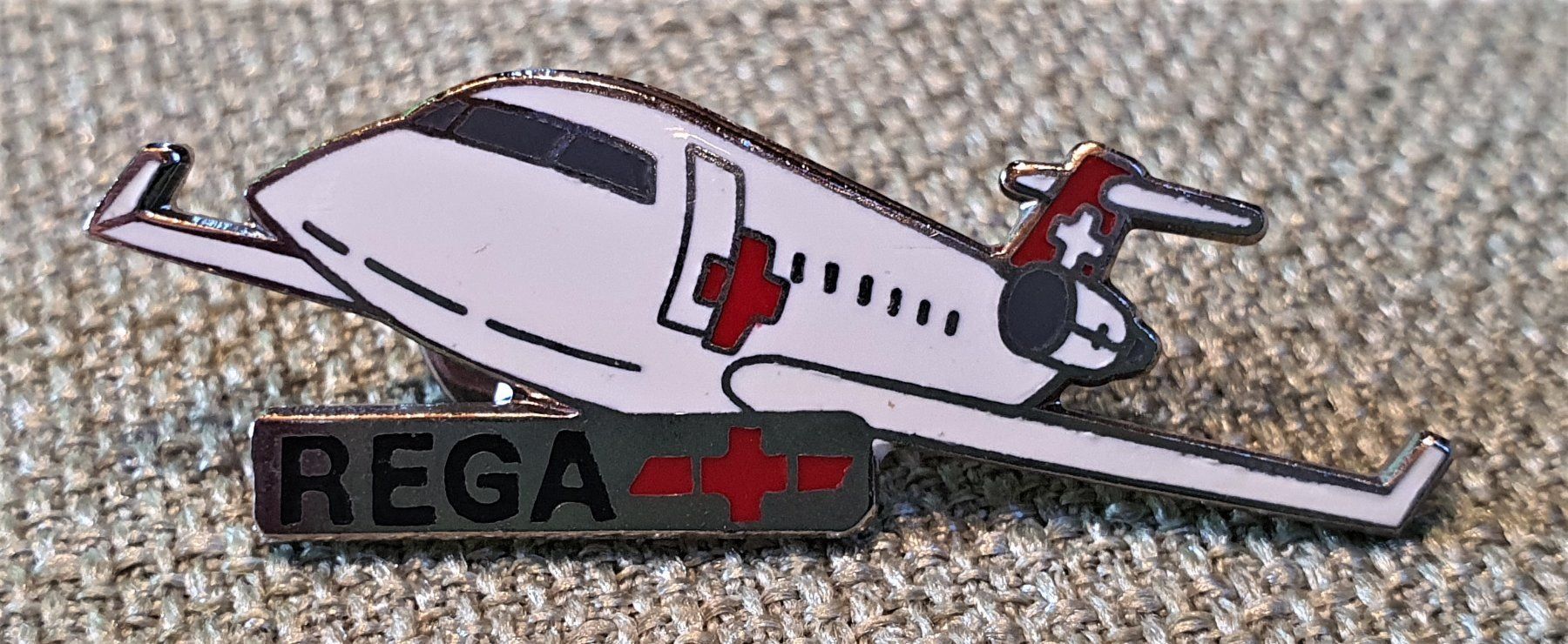 Spille: B016 - Pin Flugzeug REGA Jet - je 2.- – Usato da Reinach BL venduto da Boston-Verkauf 1