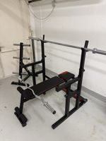 Weight Bench with Barbell and Weight Rack