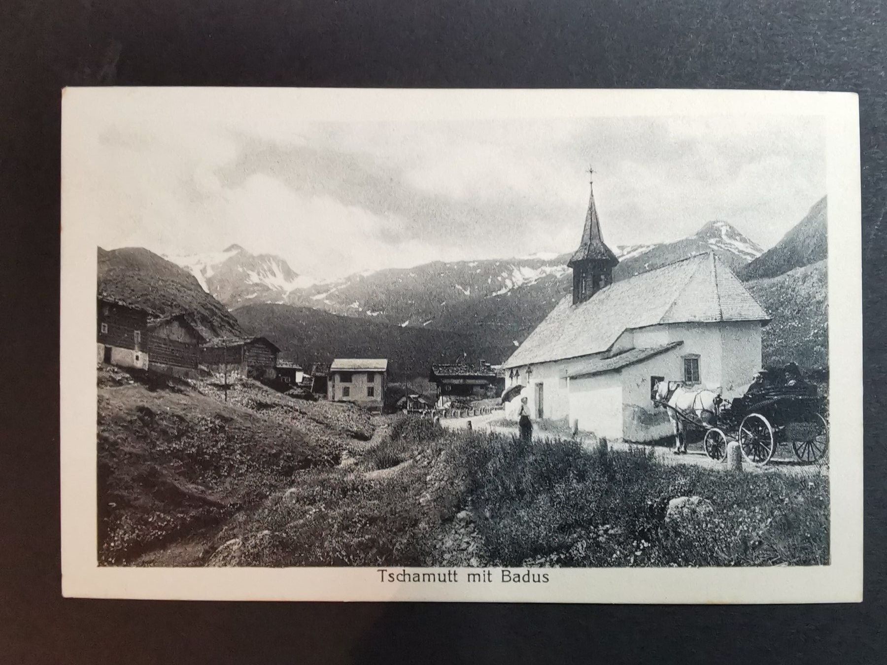 Cartoline postali: Tschamutt   Graubünden   animiert   Ansichtskarte  Kutsche – Usato da rheineck venduto da norwegianwood52