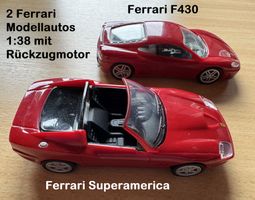 2 Modellautos Ferrari 1:38 mit Rückzug Motor