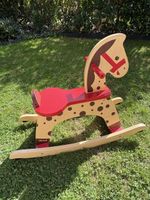 Cheval à bascule  Janod en bois bon état