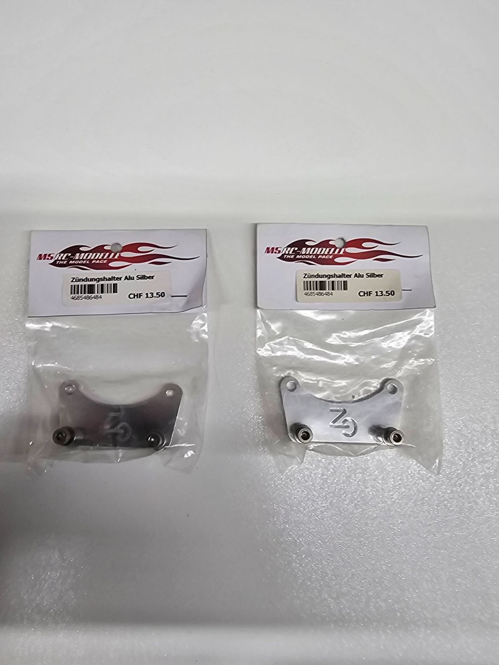 Modellismo RC: 2stk. Zündungshalter Alu – Nuovo e nell'imballaggio originale da Rüti ZH venduto da Madeira14