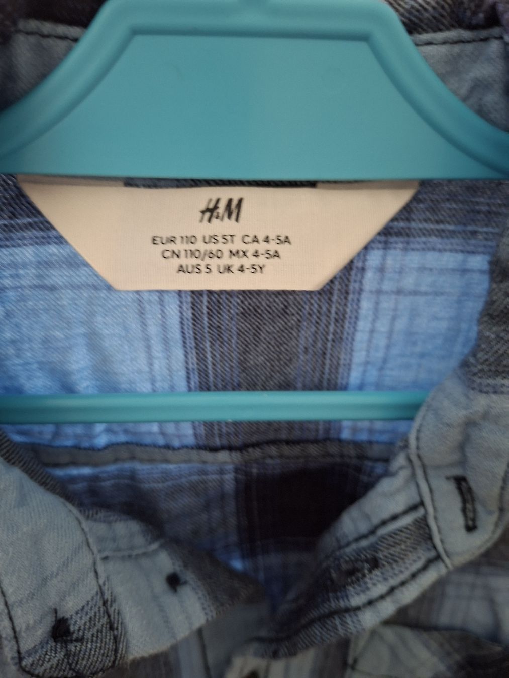 H&M Chemises, T-shirts & Polos: Kinder Hemd Karo blau Grösse 110 – D'occasion à Winterthur par Ausmisten2026 1