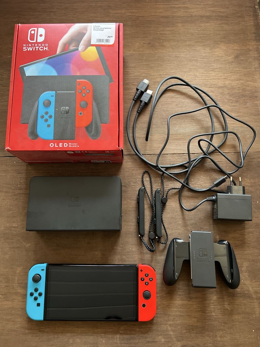 Nintendo Console: Console Nintendo Switch OLED bleu rouge avec emballage – Nuovo (secondo la descrizione) da Charmey (Gruyère) venduto da ya_12 2