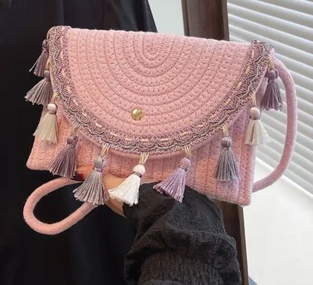 Borsa a tracolla rosa con nappine