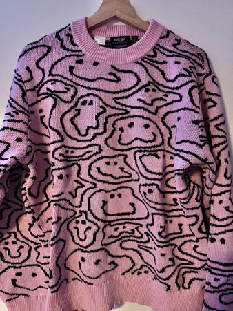 Pull WESC rose/noir motifs smileys, taille S