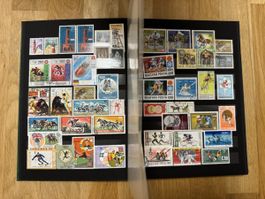 Stamp album with diverse international stamps