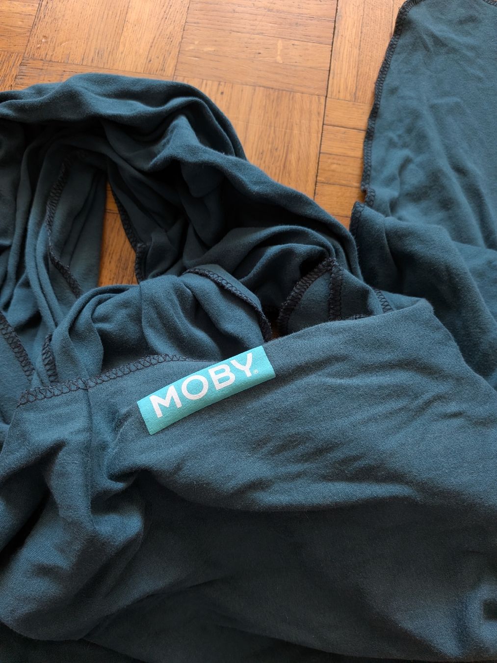 Moby Wrap Marsupi portabebè: Moby baby wrap écharpe de portage BLEUE – Usato da Genève venduto da Loloana