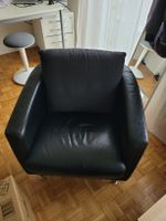 Sessel  mit grauem Kissen gebrauchter aber guter Zustand