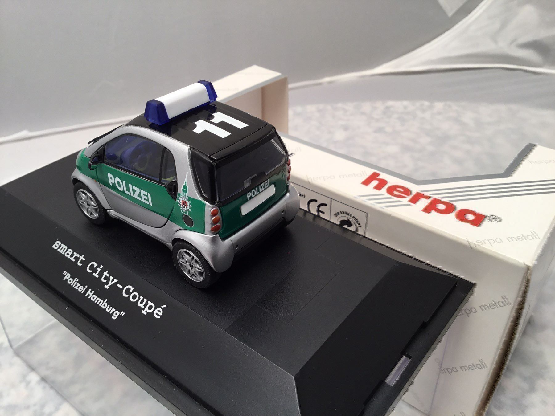 Smart Modellini d'auto: Polizei SMART – Nuovo e nell'imballaggio originale da Erlenbach im Simmental venduto da Model_box 6