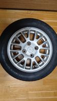 4x Mitsubishi Alufelgen 15 Zoll mit Nankang 195/60 R15