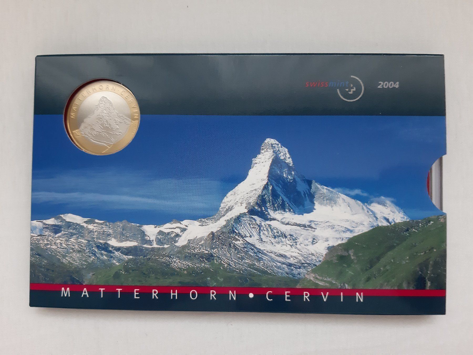 Tutti le monete: Münzsatz 2004 stgl NEU! – Nuovo e nell'imballaggio originale da Pfäffikon ZH venduto da Schweizer_Muenzen