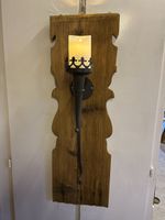 Rustikale Wanddeko mit Kerzenhalter für stimmungsvolles Lich
