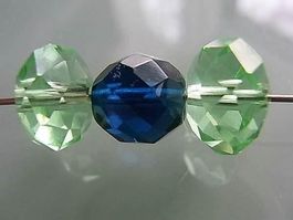 Rondelle Glas facettiert grün 12x8mm