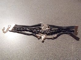 Armband schwarz/ver. Stränge/Anhänger  Affe / Lebensbaum