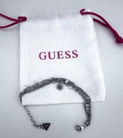Neuwertiges GUESS Armband mit Strass-Steinen, Silberfarben