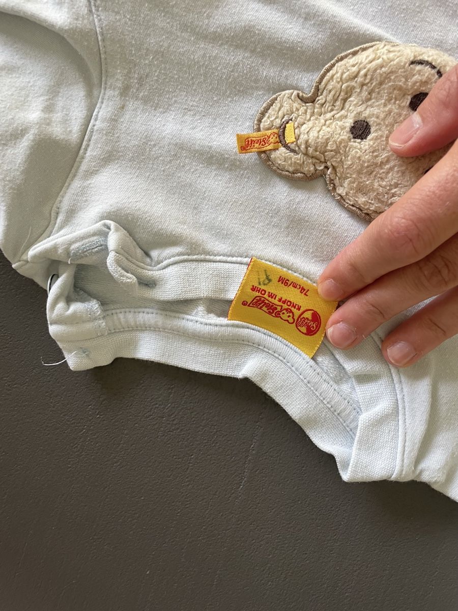 Steiff Pulls et sweat-shirts: Steiff Pullover hellblau in Gr 74 – D'occasion à Maienfeld par viola93 1