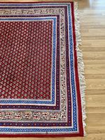 Orientteppich rot mit Fransen