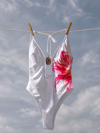 Badeanzug weiss Grösse M mit Blumenprint guter Zustand