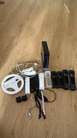 Nintendo Wii mit Controller und Spielen