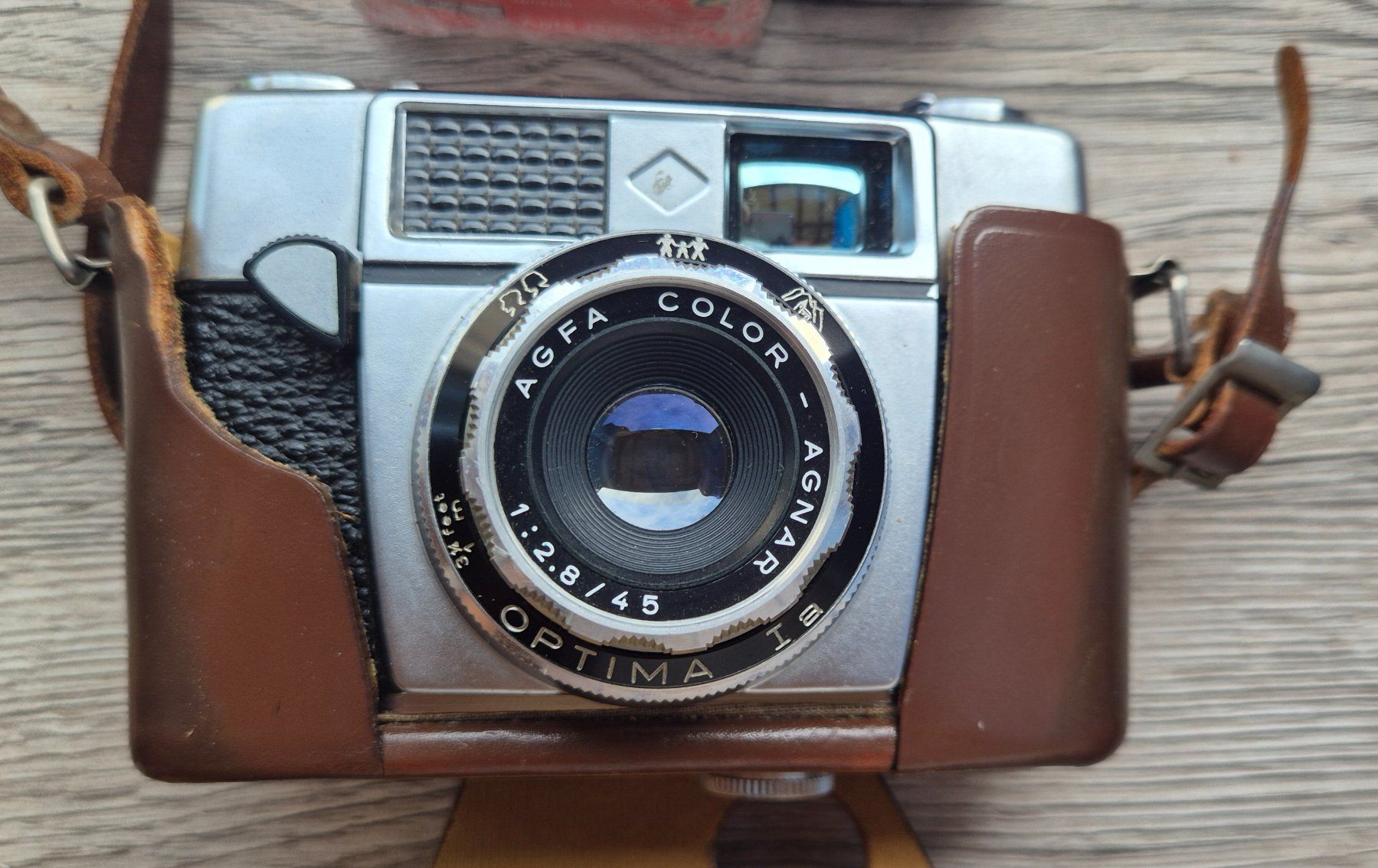 Agfa Fotocamera: Agfa Optima 1a Kamera mit Blitzaufsatz + 3 Filmen – Usato da Neerach venduto da SilliS 1