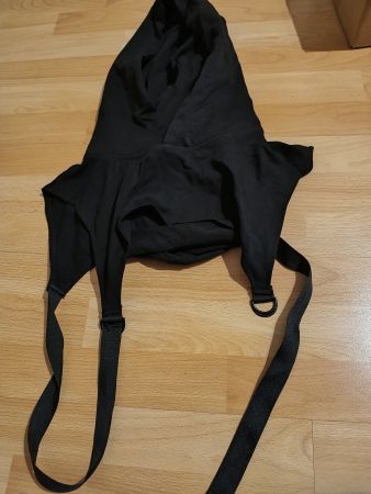 Kaputzenmütze und Beinstulpen