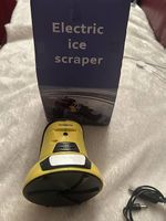 Dégivreur  / Grattoir de pare-brise électrique rechargeable 