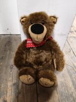 Plüschbär Brummel braun mit rotem Halstuch