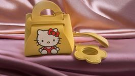 Portachiavi Hello Kitty giallo borsa con specchio nuovo