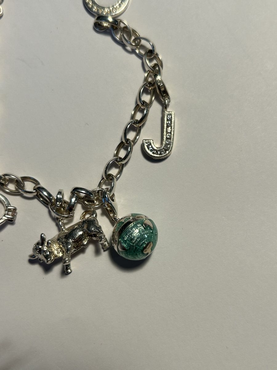 Thomas Sabo Bracciali & Braccialetti: Thomas Sabo Armband mit 5 Anhängern – Nuovo (secondo la descrizione) da Horgen venduto da mar_9yv7 2