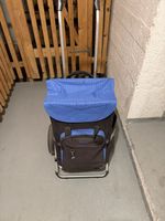 Einkaufstrolley blau schwarz in gebrauchtem Zustand